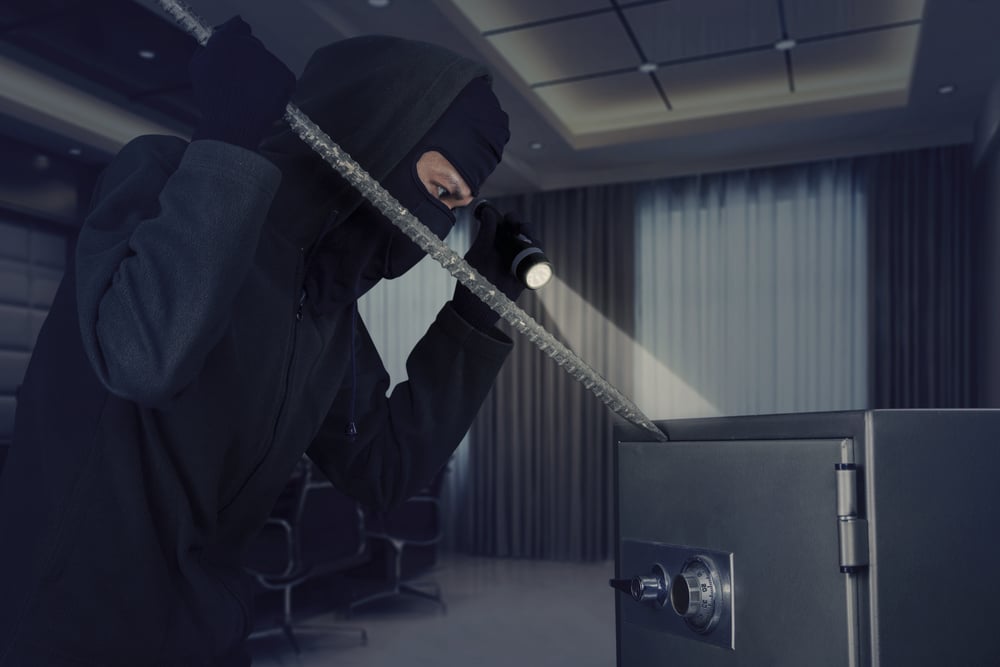 A burglar breaks into a safe to steal away important documents, just as an agent's agent of record status could be stolen.